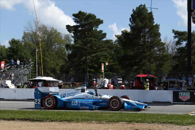 Simon Pagenaud flashes across the start/finish line to win the Honda Indy 200 at Mid-Ohio -- Photo by: Chris Jones
