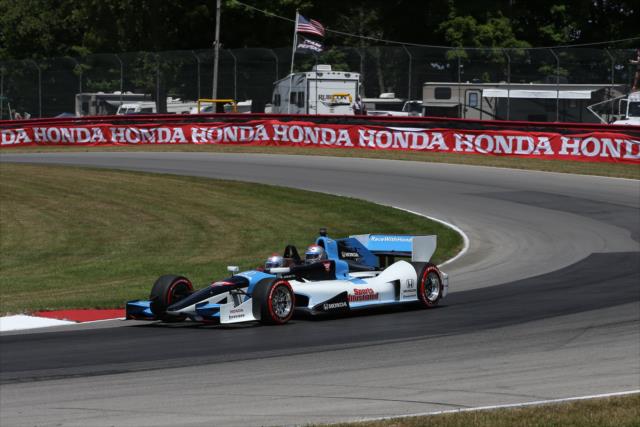 The Honda Fastest Seat in Sports two-seater rounds the Carousel turn during the parade laps prior to the start of the Honda Indy 200 at Mid-Ohio -- Photo by: Chris Jones