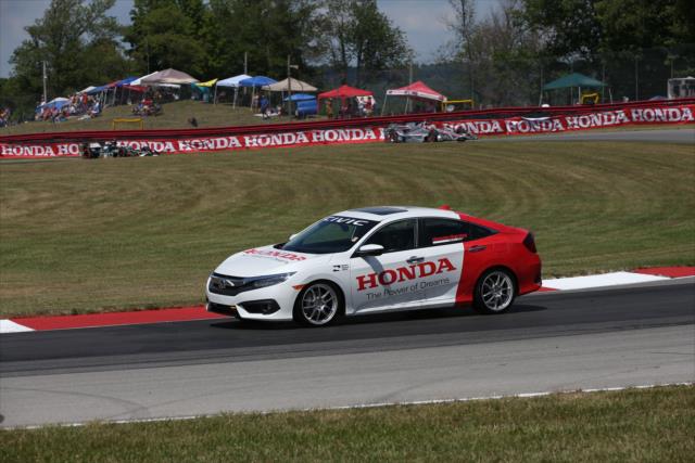 The Honda Civic pace car rounds Turn 12 during the parade laps prior to the start of the Honda Indy 200 at Mid-Ohio -- Photo by: Chris Jones