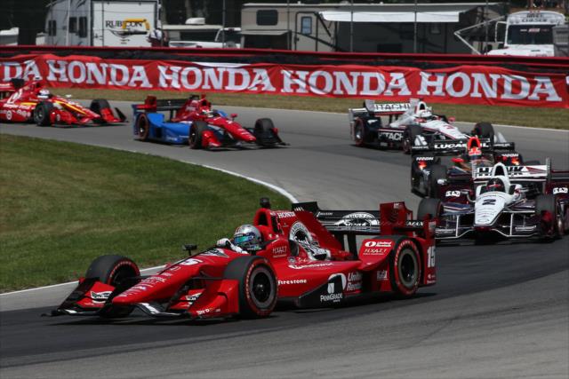 Graham Rahal leads a group through the Turn 12 Carousel turn during the Honda Indy 200 at Mid-Ohio -- Photo by: Chris Jones