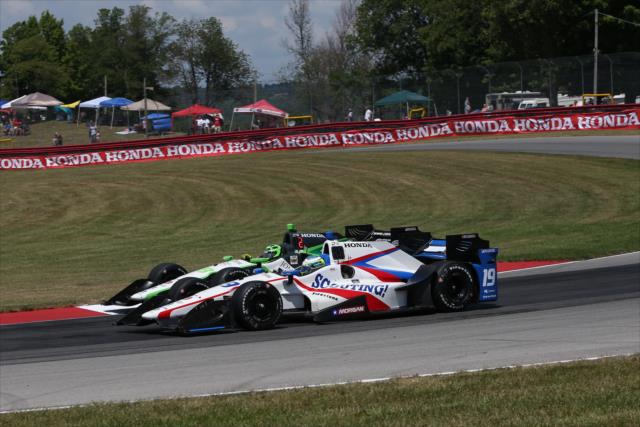 Teammates Conor Daly and RC Enerson go side-by-side through the Carousel turn during the Honda Indy 200 at Mid-Ohio -- Photo by: Chris Jones