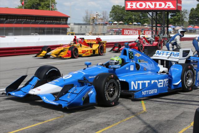 Tony Kanaan peels out of pit lane following service during the Honda Indy 200 at Mid-Ohio -- Photo by: Chris Jones