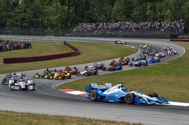 Simon Pagenaud leads the field through Turns 4 & 5 during the start of the Honda Indy 200 at Mid-Ohio -- Photo by: Chris Owens