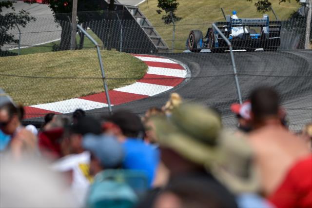 Simon Pagenaud crests the Turn 5 hill during the Honda Indy 200 at Mid-Ohio -- Photo by: Chris Owens