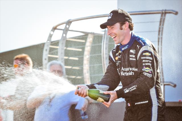 Simon Pagenaud sprays the champagne in Victory Circle following his win in the Honda Indy 200 at Mid-Ohio -- Photo by: Chris Owens