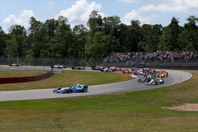 Simon Pagenaud leads the field through Turn 4 during the start of the Honda Indy 200 at Mid-Ohio -- Photo by: Joe Skibinski