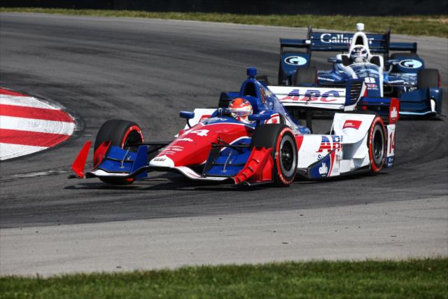 Carlos Munoz and Max Chilton duel through the Turn 2 Keyhole turn during the Honda Indy 200 at Mid-Ohio -- Photo by: Bret Kelley