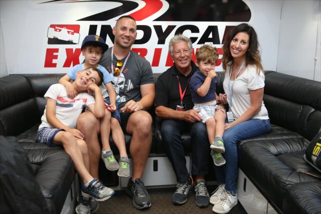 Mario Andretti with former MLB slugger Travis Hafner and his family at Mid-Ohio -- Photo by: Chris Jones