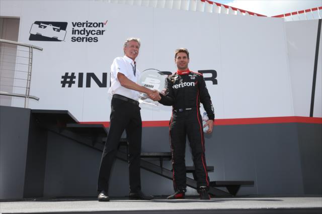 Will Power accepts the Verizon P1 Award for winning the pole position for the Honda Indy 200 at Mid-Ohio -- Photo by: Chris Jones
