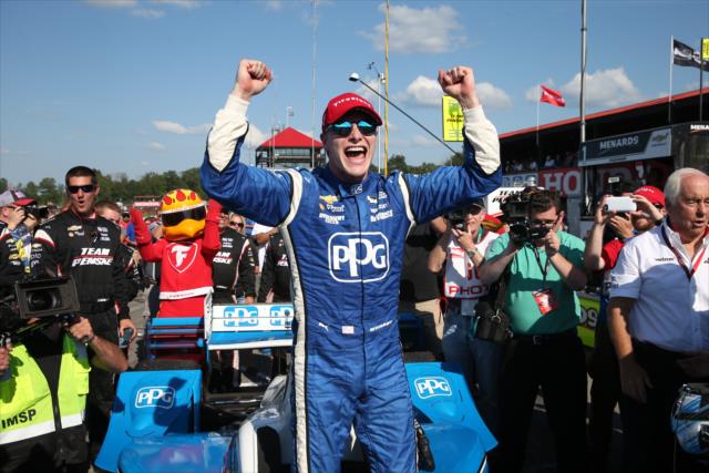 Josef Newgarden begins the celebration in Victory Lane after winning the Honda Indy 200 at Mid-Ohio -- Photo by: Chris Jones