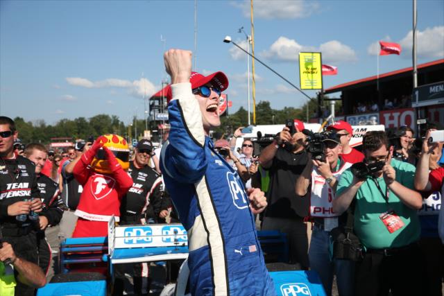 Josef Newgarden begins the celebration in Victory Lane after winning the Honda Indy 200 at Mid-Ohio -- Photo by: Chris Jones