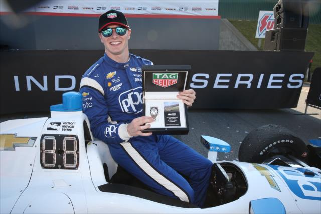 Josef Newgarden with his TAG Heuer Winners' Watch in Victory Circle after winning the Honda Indy 200 at Mid-Ohio -- Photo by: Chris Jones