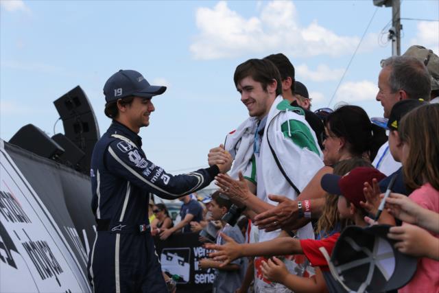 Esteban Gutierrez greets the fans during pre-race introductions for the Honda Indy 200 at Mid-Ohio -- Photo by: Chris Jones