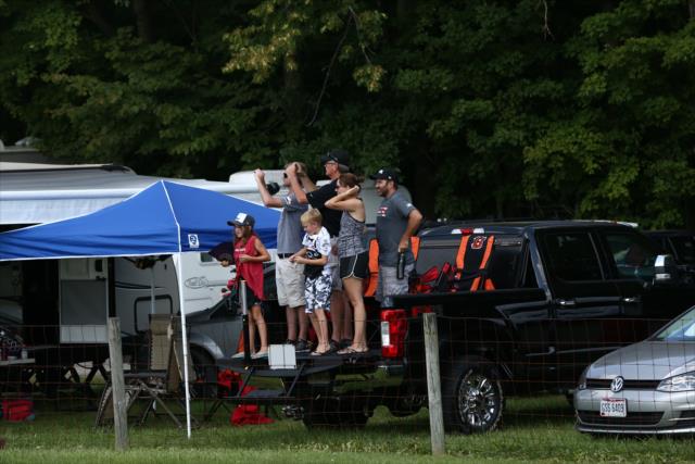 Fans watch the action from their tailgate during the Honda Indy 200 at Mid-Ohio -- Photo by: Chris Jones