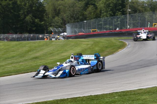 Tony Kanaan sails into the Turn 12 Carousel during the Honda Indy 200 at Mid-Ohio -- Photo by: Chris Jones