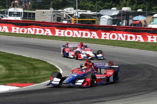 Teammates Alexander Rossi and Marco Andretti sail into the Turn 12 Carousel during the Honda Indy 200 at Mid-Ohio -- Photo by: Chris Jones