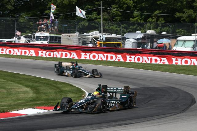 Teammates Spencer Pigot and JR Hildebrand sail into the Turn 12 Carousel during the Honda Indy 200 at Mid-Ohio -- Photo by: Chris Jones