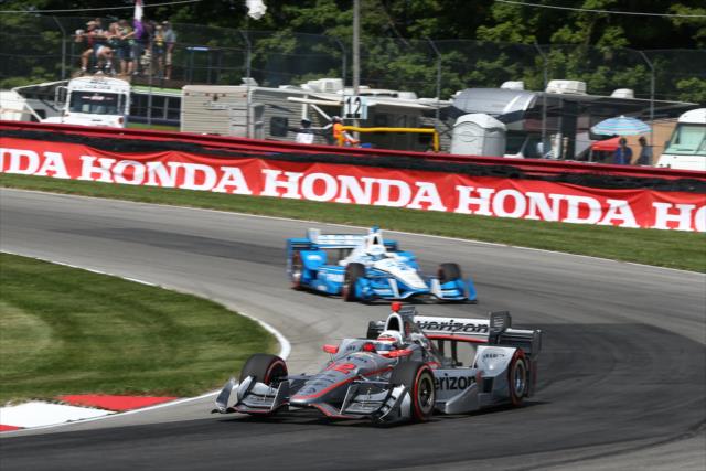 Teammates Will Power and Josef Newgarden sail into the Turn 12 Carousel during the Honda Indy 200 at Mid-Ohio -- Photo by: Chris Jones