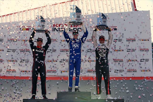 The confetti flies as Josef Newgarden, Will Power, and Graham Rahal hoist their trophies in Victory Circle following the Honda Indy 200 at Mid-Ohio -- Photo by: Chris Jones