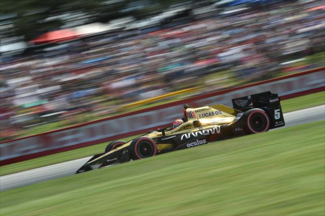 James Hinchcliffe flies down the Turn 5 hill during the Honda Indy 200 at Mid-Ohio -- Photo by: Chris Owens