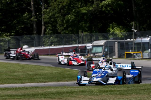 Tony Kanaan leads a group through Turn 8 during the final warmup for the Honda Indy 200 at Mid-Ohio -- Photo by: Joe Skibinski