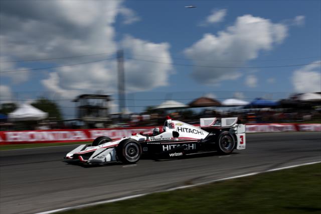 Helio Castroneves crests the Turn 5 hill in the Madness complex during the Honda Indy 200 at Mid-Ohio -- Photo by: Joe Skibinski