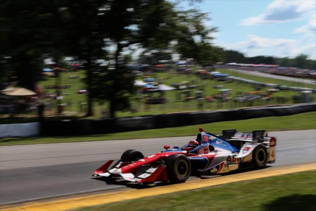 Conor Daly races up the hill toward Turn 7 during the Honda Indy 200 at Mid-Ohio -- Photo by: Joe Skibinski