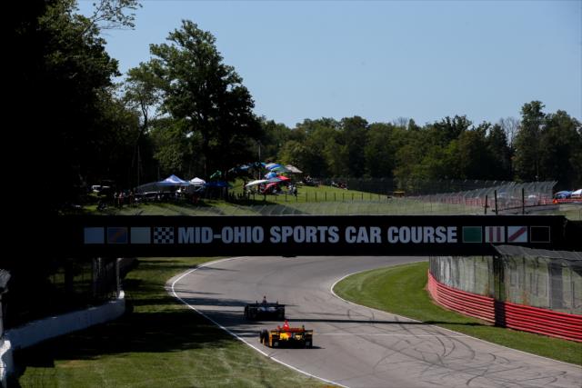 Marco Andretti and Ryan Hunter-Reay roll through Thunder Valley toward Turn 10 during the final warmup for the Honda Indy 200 at Mid-Ohio -- Photo by: Joe Skibinski