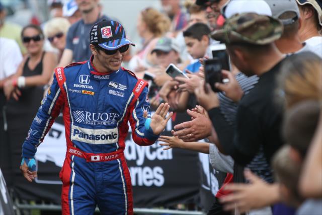 Takuma Sato greets the fans during pre-race introductions for the Honda Indy 200 at Mid-Ohio -- Photo by: Joe Skibinski