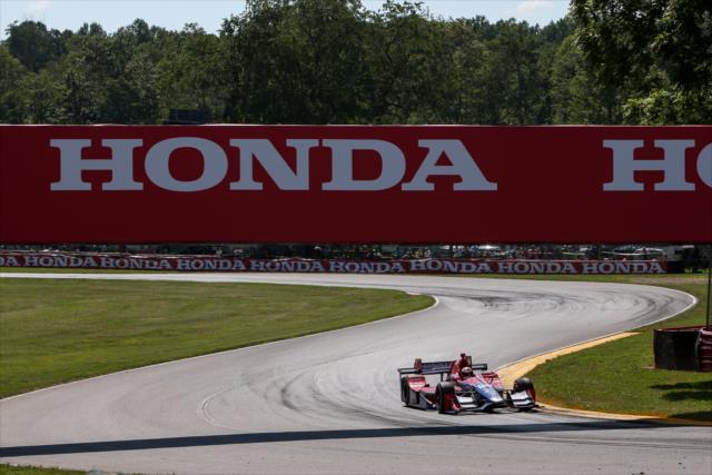 Alexander Rossi hammers the apex of Turn 7 during the Honda Indy 200 at Mid-Ohio -- Photo by: Joe Skibinski