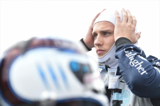 Max Chilton adjusts his balaclava on pit lane prior to the final practice for the ABC Supply 500 at Pocono Raceway -- Photo by: Chris Owens