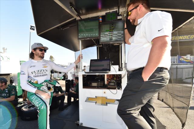 JR Hildebrand chats with an engineer prior to the final practice for the ABC Supply 500 at Pocono Raceway -- Photo by: Chris Owens