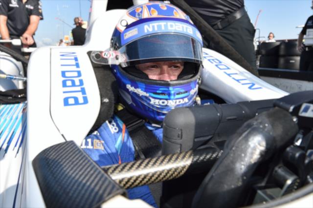 Scott Dixon sits in his No. 9 NTT Data Honda on pit lane prior to practice for the ABC Supply 500 at Pocono Raceway -- Photo by: Chris Owens