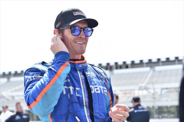 Scott Dixon sets his earpieces along pit lane prior to practice for the ABC Supply 500 at Pocono Raceway -- Photo by: Chris Owens