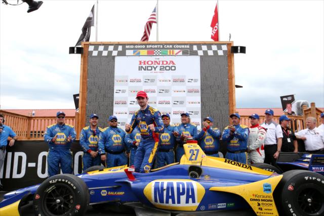Alexander Rossi begins the celebration in Victory Circle after winning the Honda Indy 200 at Mid-Ohio -- Photo by: Chris Jones