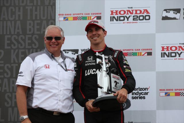 Robert Wickens accepts his 2nd Place trophy in Victory Circle following the Honda Indy 200 at Mid-Ohio -- Photo by: Chris Jones