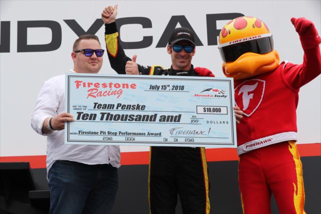 Simon Pagenaud accepts the Firestone Pit Stop Performance Award on behalf of Team Penske for their performance at Toronto -- Photo by: Chris Jones