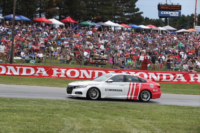 The Honda Civic pace car leads the field through Turn 5 during the parade laps prior to the start of the Honda Indy 200 at Mid-Ohio -- Photo by: Chris Jones