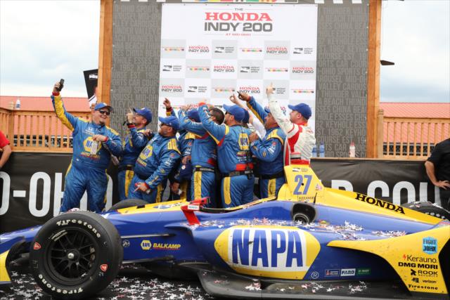 Alexander Rossi and Andretti Autosport pose for a selfie in Victory Circle after winning the Honda Indy 200 at Mid-Ohio -- Photo by: Chris Jones