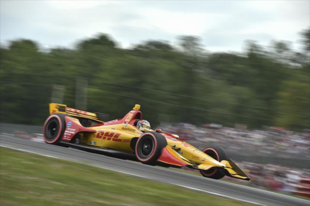 Ryan Hunter-Reay launches over the Turn 5 hill during the Honda Indy 200 at Mid-Ohio -- Photo by: Chris Owens
