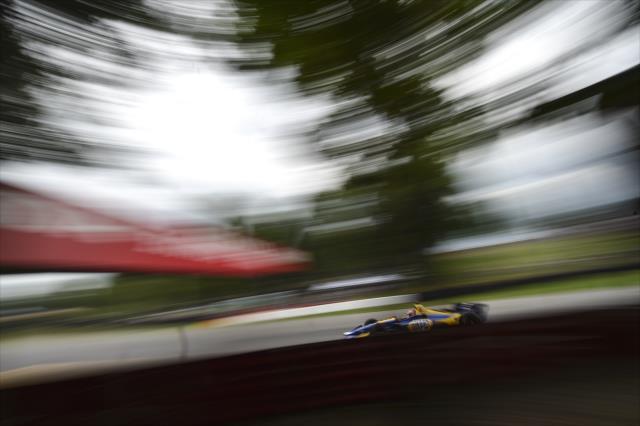 Alexander Rossi streaks under the Honda bridge through Turn 7 during the Honda Indy 200 at Mid-Ohio -- Photo by: Chris Owens