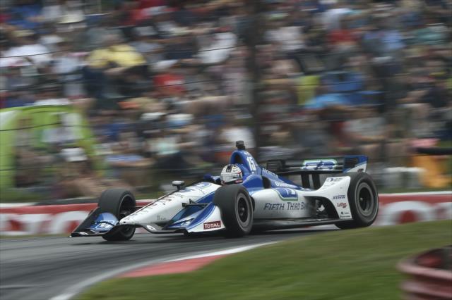 Graham Rahal screams over the Turn 5 hill during the Honda Indy 200 at Mid-Ohio -- Photo by: Chris Owens