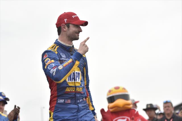 Alexander Rossi begins the celebration in Victory Circle after winning the Honda Indy 200 at Mid-Ohio -- Photo by: Chris Owens