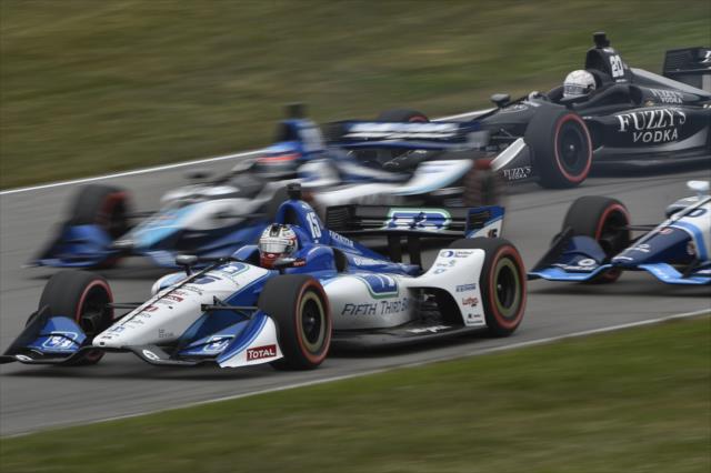 Graham Rahal leads a gaggle of cars into Turn 5 during the Honda Indy 200 at Mid-Ohio -- Photo by: Chris Owens