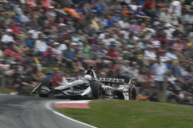 Jordan King launches over the Turn 5 hill during the Honda Indy 200 at Mid-Ohio -- Photo by: Chris Owens