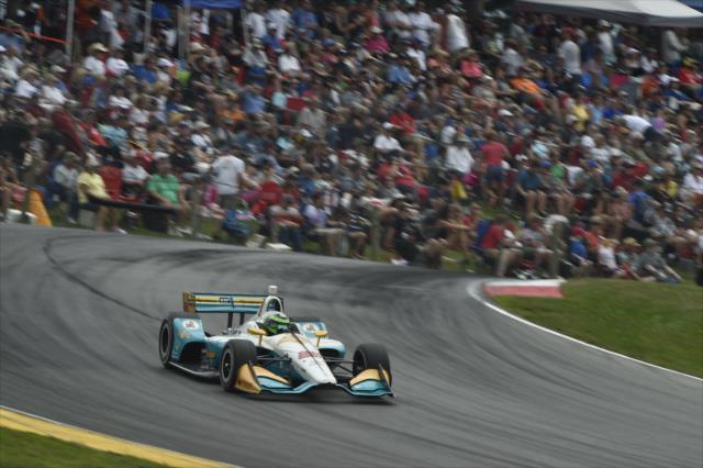 Conor Daly launches over the Turn 5 hill during the Honda Indy 200 at Mid-Ohio -- Photo by: Chris Owens