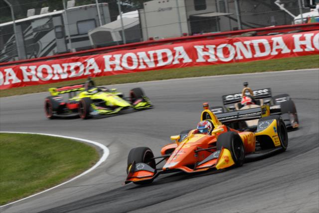 Zach Veach leads a group into the Carousel (Turn 12) during the Honda Indy 200 at Mid-Ohio -- Photo by: Joe Skibinski