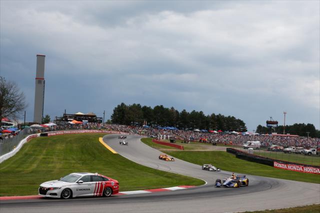 The Honda Civic pace car leads the field through Turns 5-6 during the parade laps prior to the start of the Honda Indy 200 at Mid-Ohio -- Photo by: Joe Skibinski