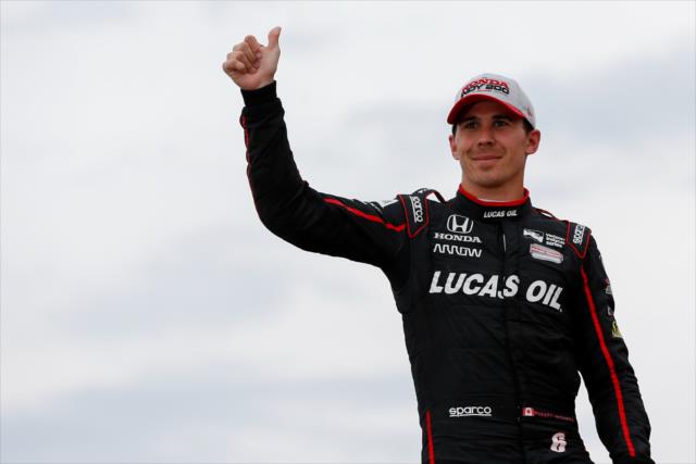Robert Wickens acknowledges the fans in Victory Circle after his 2nd Place finish during the Honda Indy 200 at Mid-Ohio -- Photo by: Joe Skibinski