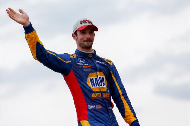 Alexander Rossi waives to the crowd in Victory Circle after winning the Honda Indy 200 at Mid-Ohio -- Photo by: Joe Skibinski